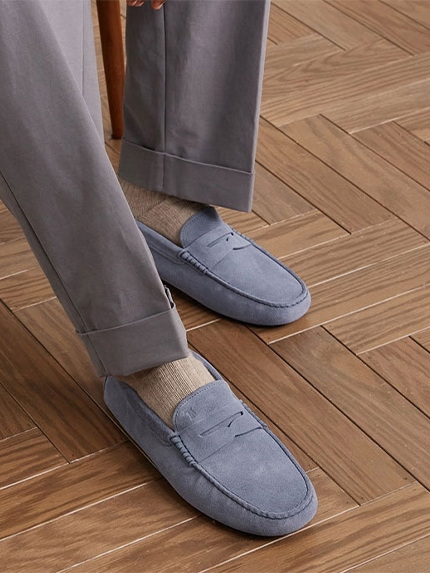 Pairs of blue moccasins from the tod's brand with a herringbone parquet sole
